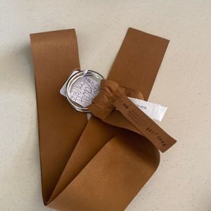 Free Proplr.  Never worn.  The perfect one-size fits all belt